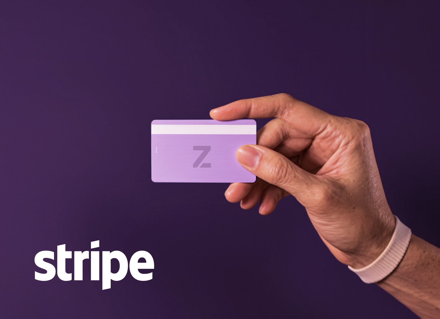 Zoe payment artwork featuring a card beside the Stripe logo.